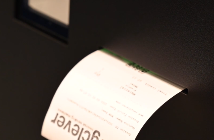 Reverse vending machine printed voucher